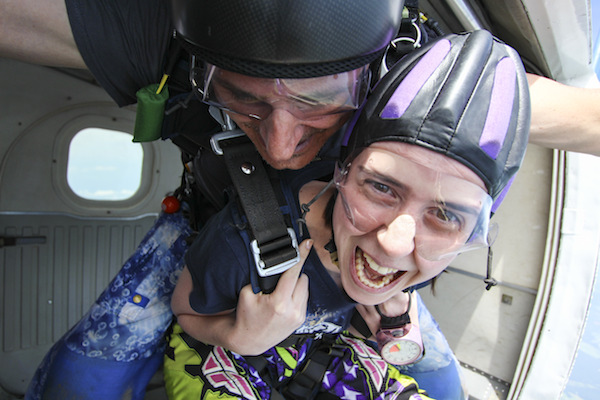 Happy Skydiver in Door of Plane