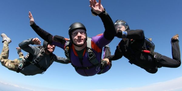 young man makes first jump towards skydiving certification