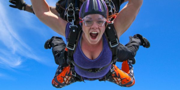 woman makes first jump at Skydive Orange