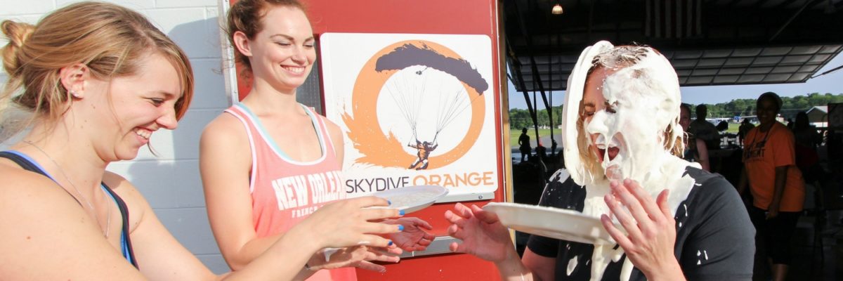 girls honor skydiving tradition of pie in the face